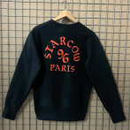 XL embroderies on a dark blue sweat shirt