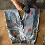 Custom "puff" printing on a pair of jeans.